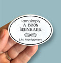Anthem Sticker Company - I am simply a book drunkard LM Montgomery quote oval magnet