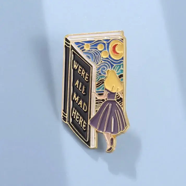 Whimsical Alice-Inspired “We’re All Mad Here” Book Pin