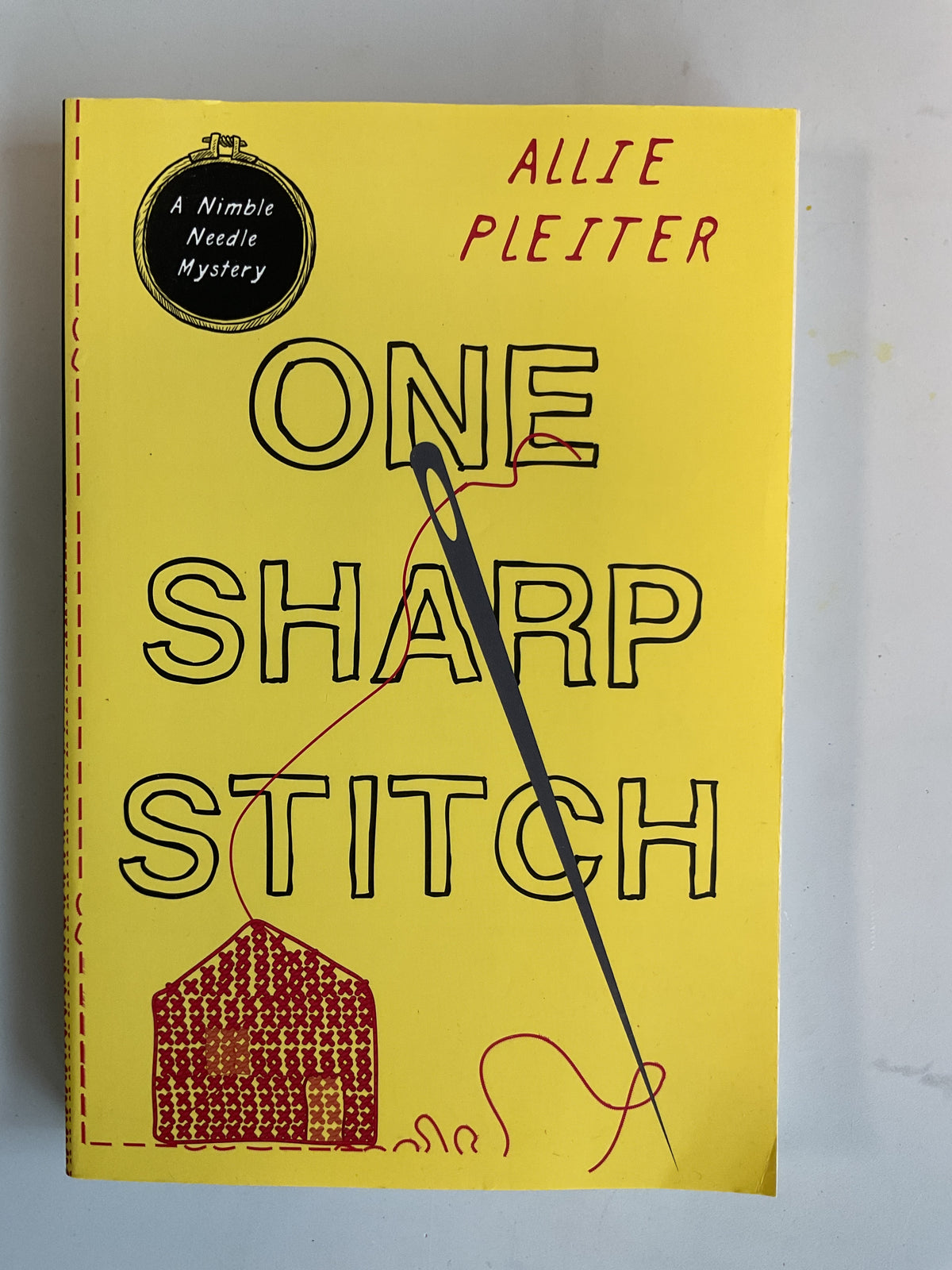 One Sharp Stitch (A Nimble Needle Mystery) by Allie Pleiter